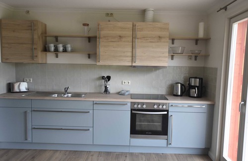 Alt Farpen Appartement | 4-room red vacation home for up to 8 people - 4-room colorful vacation homes, OVS 999