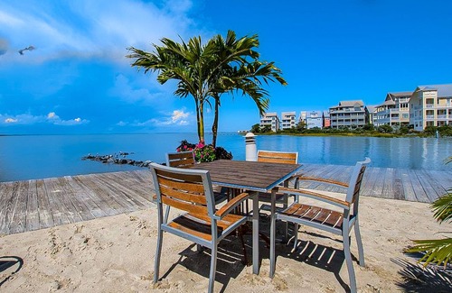 Sunset Island Maison | 4-story townhome with resort pools, beaches, water access, & great location
