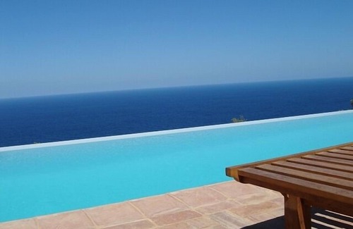 Sant Joan de Labritja Villa | 5 chambres / 5 salles de bain + 2toilet, Private Infinity Pool, 10-12 personnes, 5 ¨ forme ibiz