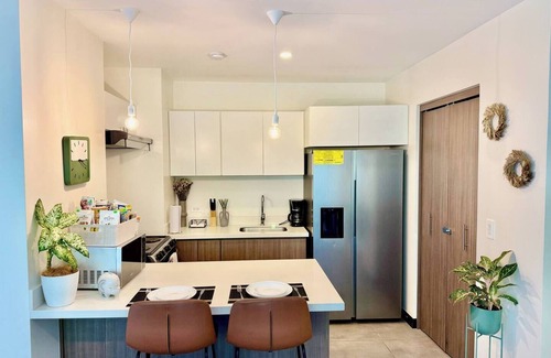 Alajuela Copropriété | 5 minutes from Airport | Transfer ($) | Pool | Gym | Full condo