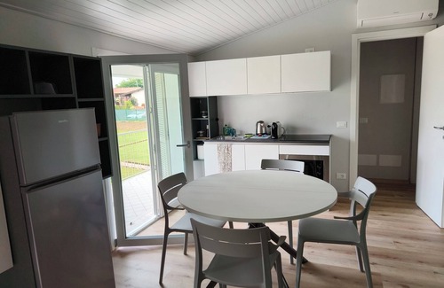Monte Appartement | 5 minutes from the lake house with garden in residence with swimming pool