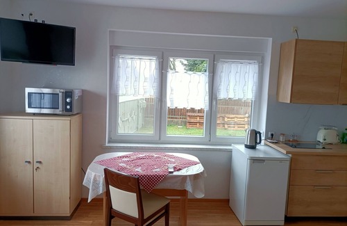 Falkenberg Appartement | 5 minutes from the Kiebitz-See recreation area. With terrace, barrier-free.