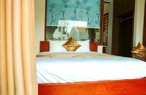 Cam Pho Lit Et Petit-Déjeuner | 5 minutes walking to the town center! Great rooms with balcony
