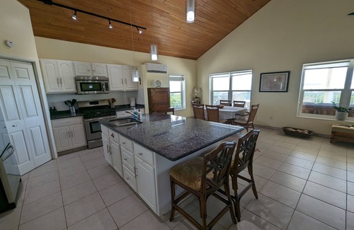 Cherokee Maison | Stunning Waterfront Villa, Beach, Dock & Boat Hire