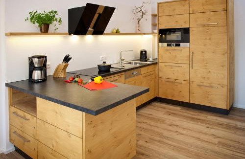 Kalzhofen Appartement | 5 Sterne Ferienwohnung Hochgratblick mit Schwimmbad und Sauna