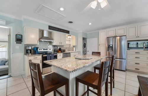 Cocoa Isles Maison | Big Beach House Close to Beach & Fun with Heated Pool, Hot Tub & Tiki Bar!