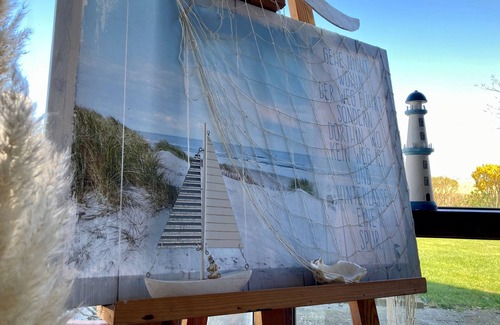 Anjum Maison | 6 personnes Maison Marijke avec jardin d'hiver et accès direct au Lauwersmeer