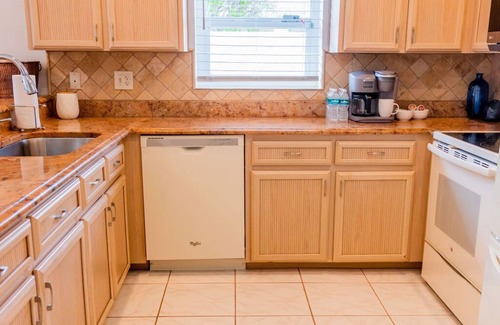 Naples Park Maison | 690 Paradise Shores Oasis | New Heated Pool & Spa
