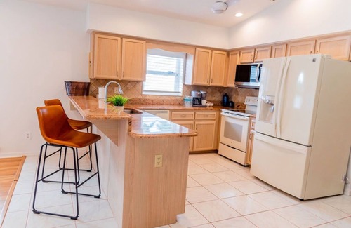 Naples Park Maison | 690 Paradise Shores Oasis | New Heated Pool & Spa