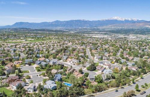 Briargate Maison | 6BR with Pool & Water Slide, Hot Tub, Peak View