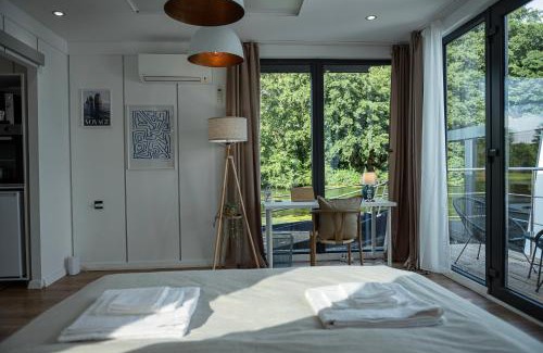 Billbrook Location De Bateaux | 80qm privates Hausboot in Hamburg-Mitte