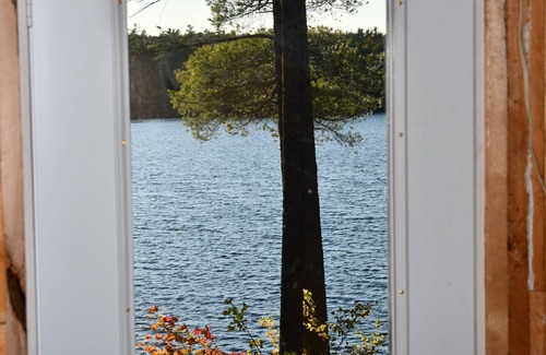 Deblois Cabine | 900 sq/ft off-grid cabin nestled on Upper Cranberry Lake. Pet Friendly!