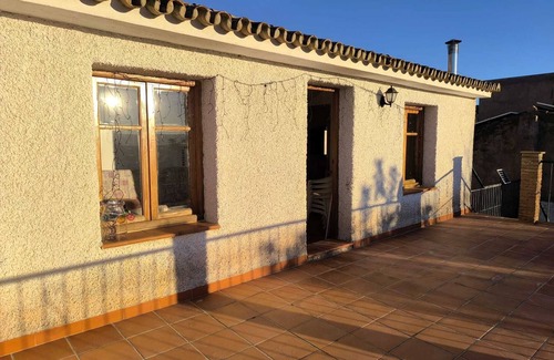 Lecrin Cottage | A balcony overlooking the Sierra Nevada.
