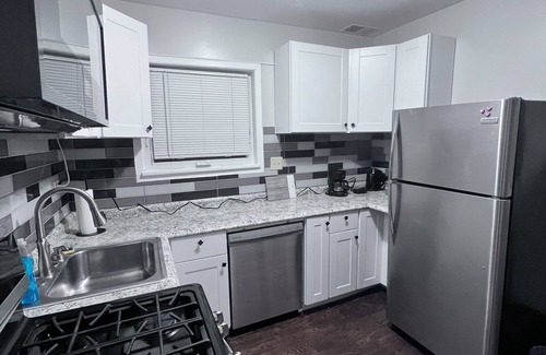 Westmont Maison | A big "Tiny" home, with large enclosed yard, next to train in downtown Westmont.