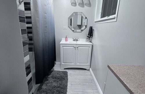 Westmont Maison | A big "Tiny" home, with large enclosed yard, next to train in downtown Westmont.