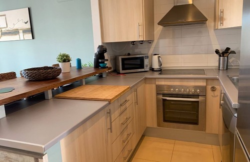 Alhama de Murcia Appartement | A fresh modern apartment on a lovely garden with a shared pool