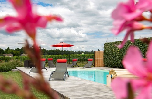 Saint-Mariens Maison | Un Gite appelé La Grange, avec jardin, barbecue et piscine chauffée