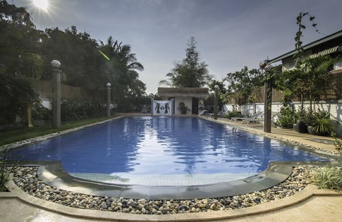 Siem Reap Maison | Un habitat loin du domicile! Immeuble coloré avec chambres privées et espaces communs.