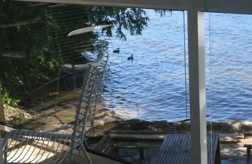 Frontenac Maison | A hot tub, view and lake to die for: relax on our deck and watch the loons