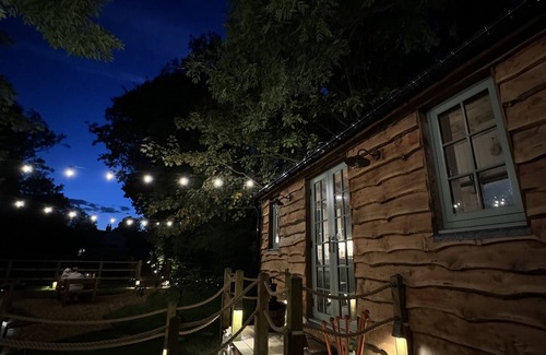 Warrington Cabine | A peaceful countryside retreat with a private hot tub and cozy log burner.