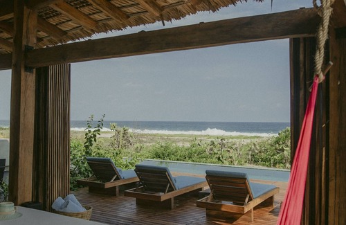 Puerto Escondido Maison | Une atmosphère sophistiquée sur une plage vierge.