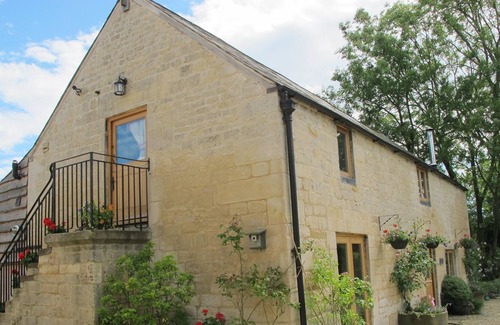 Brimpsfield Appartement | Un appartement spacieux au premier étage situé dans la conversion de grange