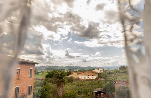 Pozzo Appartement | Maison typique située dans le village historique de Pozzo della Chiana, avec une grande terrasse meu