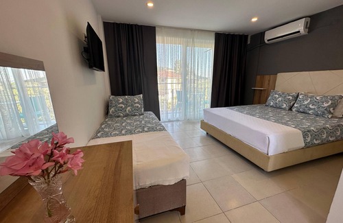 Marmara Lit Et Petit-Déjeuner | Adasu Otel