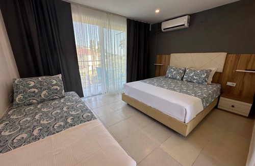 Marmara Lit Et Petit-Déjeuner | Adasu Otel