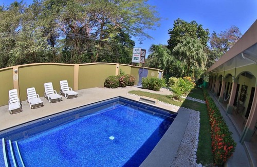 Potrero Cabine | Affordable Comfort in a 2-bed Hotel Room in Potrero With Pool - TV and AC