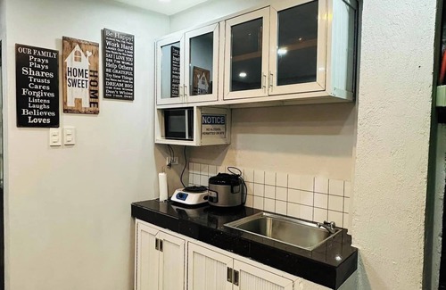 Santa Rosa Maison | Affordable Cozy rest house with pools , free wifi and parking on site