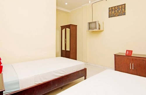 Downtown Kuta Maison | Maison d'hôtes abordable au cœur de Poppies Lane, Legian (SGRSDH)