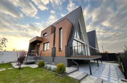 Tunari Appartement | AGrey frame Residence Villas