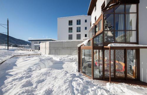 Davos Appartement | Agrimonia - 5,5-Zi Duplex Wohnung bis 11 Personen mit eigenem Garten