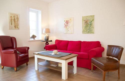 Eyendorf Maison | Ahrentschildt's Ferienwohnung im Reetdachhaus