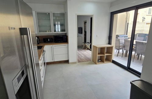 Nemours Maison | Air-conditioned house in the center of town on a quiet street close to all amenities.