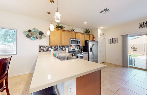 Buckeye Maison | Airy desert home with an enclosed yard, private pool, hot tub, firepit, & W/D