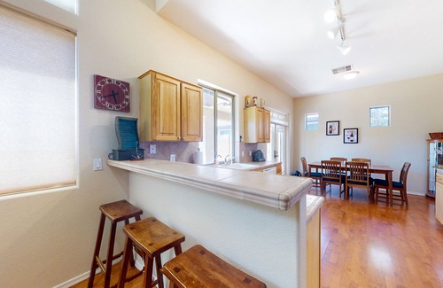 Palm Valley Maison | Airy home with private heated pool, firepit, grill, enclosed backyard, cornhole