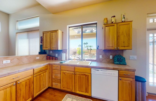 Palm Valley Maison | Airy home with private heated pool, firepit, grill, enclosed backyard, cornhole