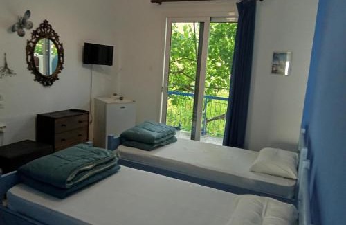 Egira Maison | Akri Rooms