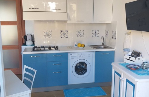 Lido Appartement | Alghero à quelques pas de la mer, terrasse donnant sur Capo Caccia