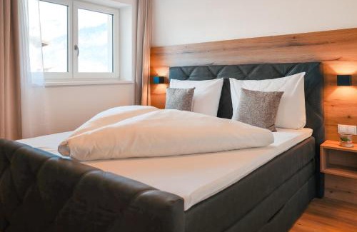 Schlitters Appartement | AlpenLuxus presents - IRMIS Zillertalblick with Cozy Living Area and Car Park