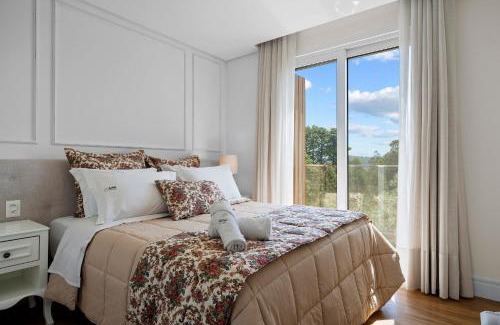 Tirol Appartement | Alpes da Montanha Duplex 2 dorm by Achei Gramado