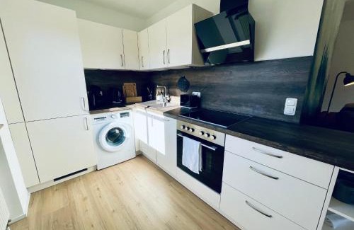 Bad Kohlgrub Appartement | Alpine Gemütlichkeit für 4 mit großer Sonnenterrasse