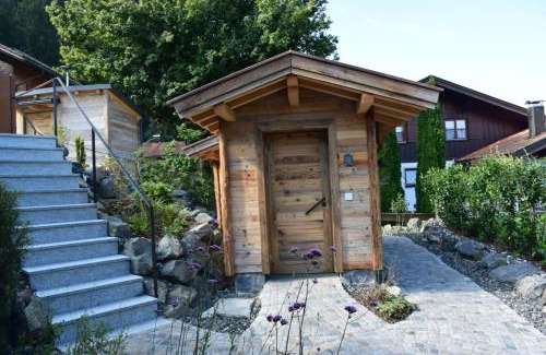 Kranzegg Appartement | Alpinum Chalet mit privater Außensauna