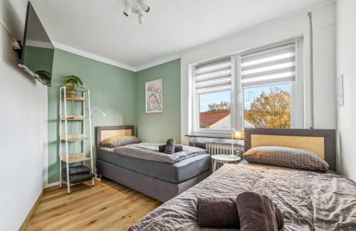 Kaiserslautern Appartement | Amalfi A02 - 2 Zi für 4P - Balkon, smart TV, Boxspringbett