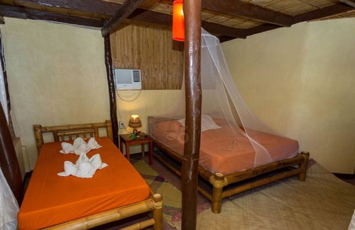 Abra de Ilog Station Balnéaire | AMAMI BEACH RESORT, style indigène à 20 mètres du bord de mer