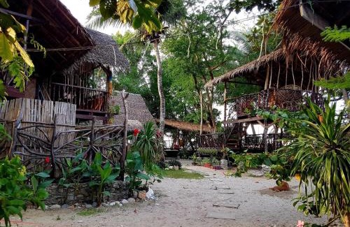 Abra de Ilog Hôtel | Amami Beachfront Bungalows & Villa