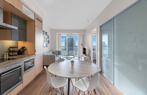Wellington Place Hôtel | Amazing 1BR Suite - Rooftop Pool - View