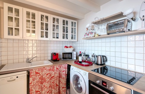 Quartier de la Place-Vendome Appartement | Magnifique appartement avec mezzanine et des tonnes de charme par Le Louvre et le Jardin des Tuileries!